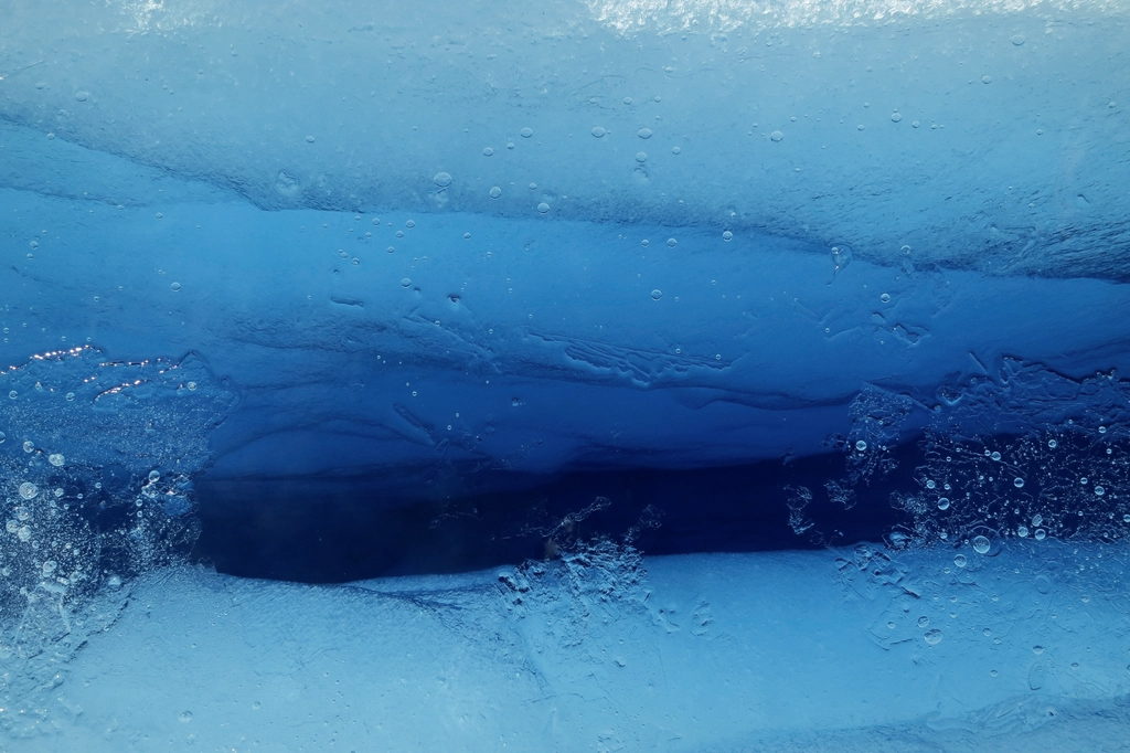 Deep blue meltwater and ice