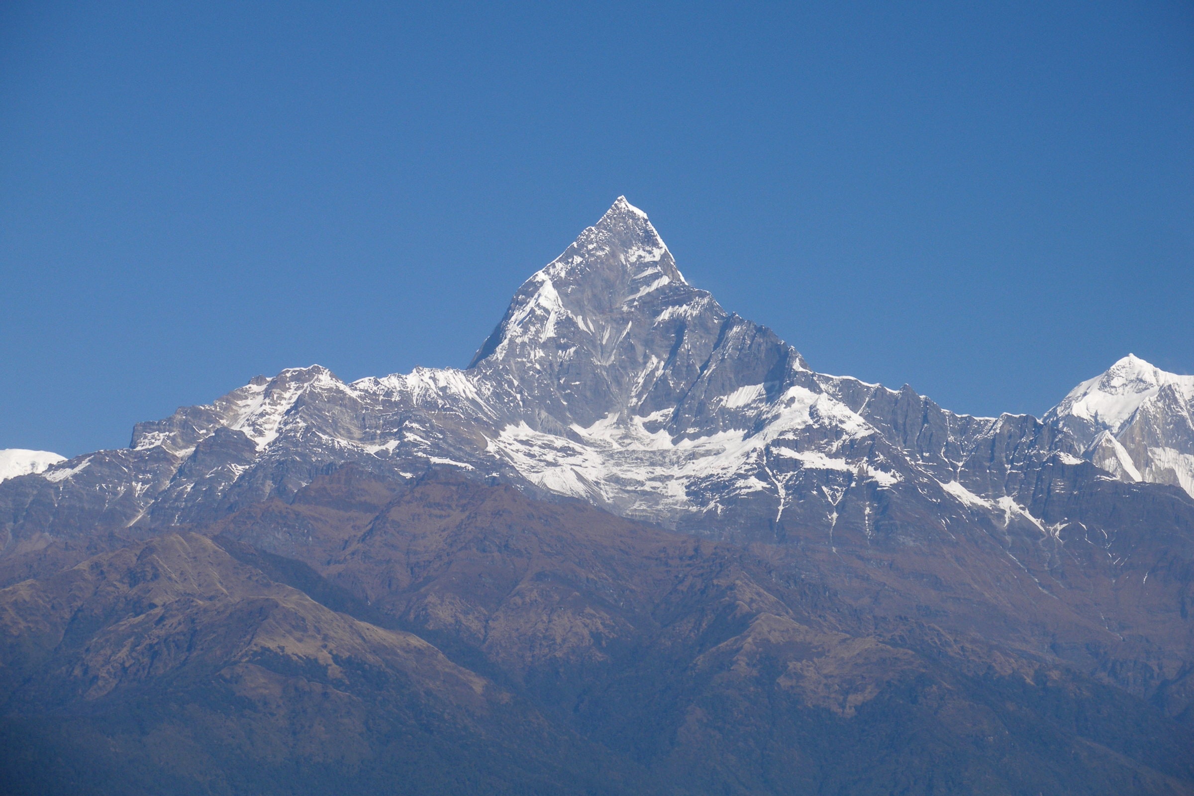 Machapuchare rising behind the ridges north of Pokhara